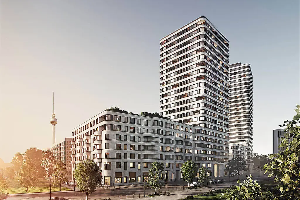 Das UPSIDE in Berlin an der Spree mit zwei hohen, abgerundeten Türmen