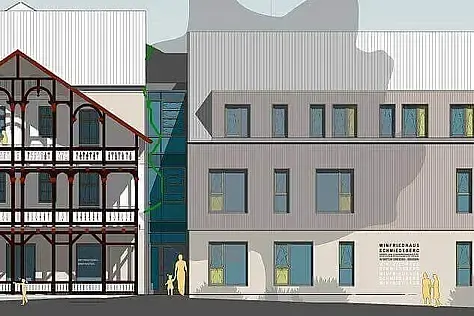 Weiß-graue Zeichnung des Winfriedhauses mit Anbau in Frontalansicht